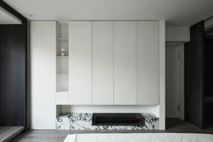 Modern bedroom featuring a marble storage unit