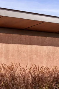 A modern, concrete-built architectural structure with a flat roof.