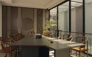 A clean, minimalist office with large glass windows, wooden furniture, and a sleek, contemporary design.