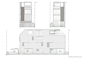 A modern residential building's floor plan featuring a concrete structure with large windows.