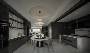 Modern kitchen featuring black appliances and marble countertop