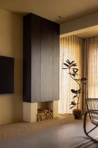 Minimalist living room featuring wooden and bamboo elements