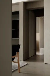 Modern minimalist floor interior with wooden flooring and minimalist design elements.