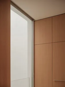 A sophisticated interior design featuring modern wooden panels, suitable for high-end residential or commercial spaces.