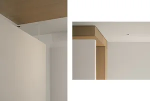 Contemporary interior design featuring wood paneling and minimalist aesthetics.