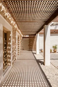 A modern wooden patio with a glazed tiled floor.