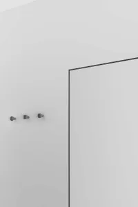 Modern, minimalist interior design featuring a glass panel wall.