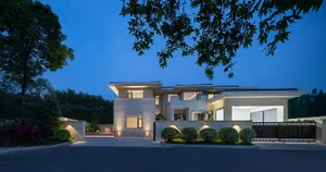 A modern architectural house with concrete and glass materials.