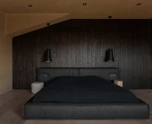 A minimalist black bedroom with wood paneling and a black bed frame.