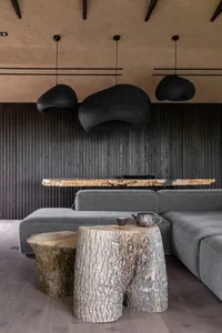 Modern living room featuring wooden details and minimalist design.