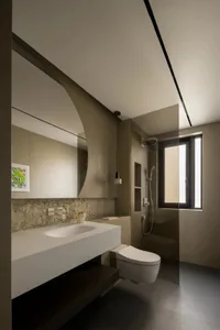 Modern minimalist bathroom with concrete walls, floating vanity, and sleek design elements.