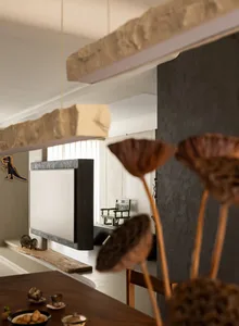 Modern living room featuring concrete walls and wooden furniture.