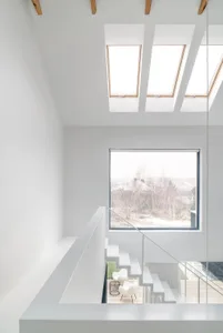 Modern minimalist white concrete and glass interior design