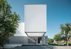 A modern building with a concrete exterior and minimalist design.