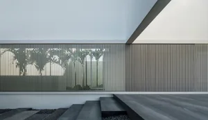 A modern exterior design featuring concrete materials.