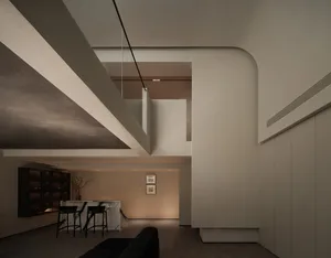 Modern residential space featuring concrete, marble, and glass materials.