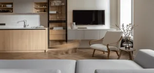 Modern living space featuring a wooden floor, white furniture, and minimalist decor.