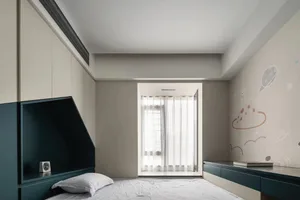 A modern children's bedroom with white walls, a single bed, and a space-themed wall mural featuring planets and clouds.