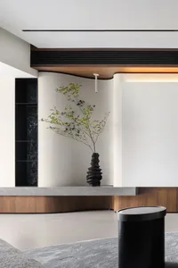 Modern living space featuring a contemporary concrete setting with minimalist design elements.