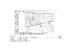 2D architectural drawing of a modern residential living space with concrete, glass, and steel materials.