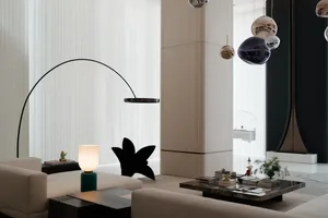 A modern minimalist living space with sleek, contemporary furniture and minimal decor.