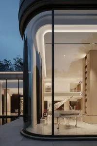 Modern living room featuring glass walls, marble flooring, and wooden accents.