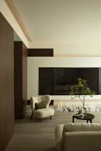 Modern living room with marble and wooden elements