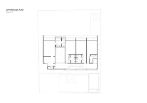 A 2D architectural drawing of the upper floor plan of a modern house.