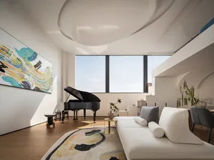Modern minimalist living room with a piano, large window, and abstract art on the wall.