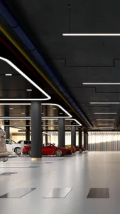 Modern industrial concrete lobby interior with exposed concrete walls, metal beams, and minimalistic design features.