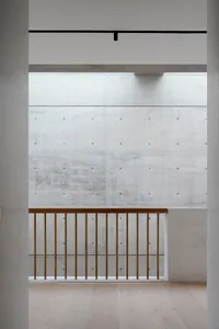 Modern office space featuring concrete and metal materials.