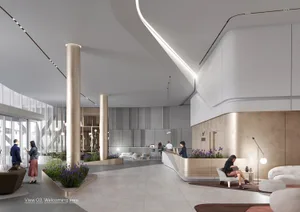 A modern lobby with concrete and steel materials and a welcoming area.