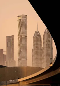 A cityscape featuring modern glass-topped skyscrapers.
