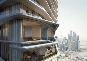 A modern apartment featuring concrete interiors with large windows overlooking a cityscape.