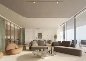 Modern living room with a large glass wall and contemporary furniture.