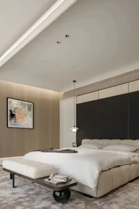 A modern minimalist bedroom with a blush pink upholstered bed, clean lines, and a warm, inviting atmosphere.