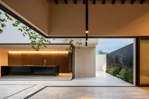 Modern residential kitchen featuring concrete materials
