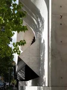 Modern house with curved concrete facade