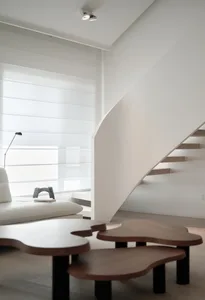 White and wooden living room with a modern design.