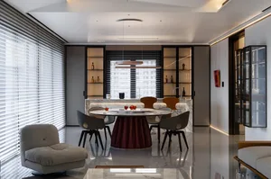 Modern dining room featuring marble table and minimalist decor.