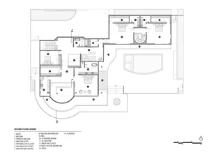 Floor plan of a residential second floor with various rooms and amenities.