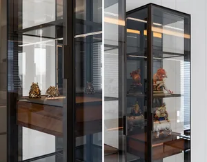 Modern glass and metal shelving display case with decorative sculptures.