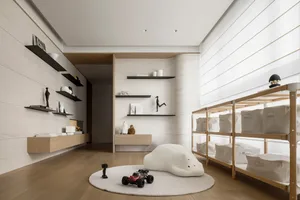 A modern playroom with a round rug, a plush cloud-shaped pillow, and a shelf with various decorative items.