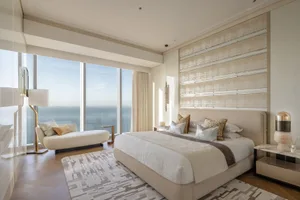 Modern minimalist bedroom with fabric bedding, wooden floor, and metal accents.