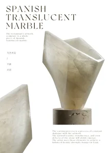A modern, minimalist sculpture made of Spanish translucent marble features clean lines and geometric forms.