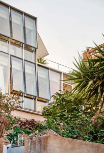 A modern house featuring large glass windows