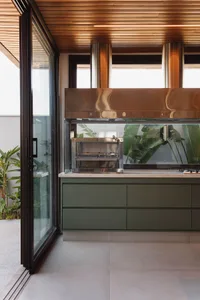 Modern residential kitchen featuring stainless steel appliances and cabinetry.
