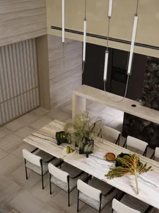 Modern dining room featuring marble table and chairs with minimalist design