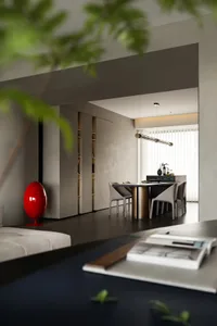 Contemporary design with concrete finishes in an open-plan living and dining area.