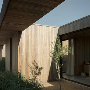 A modern exterior building facade constructed from wood.